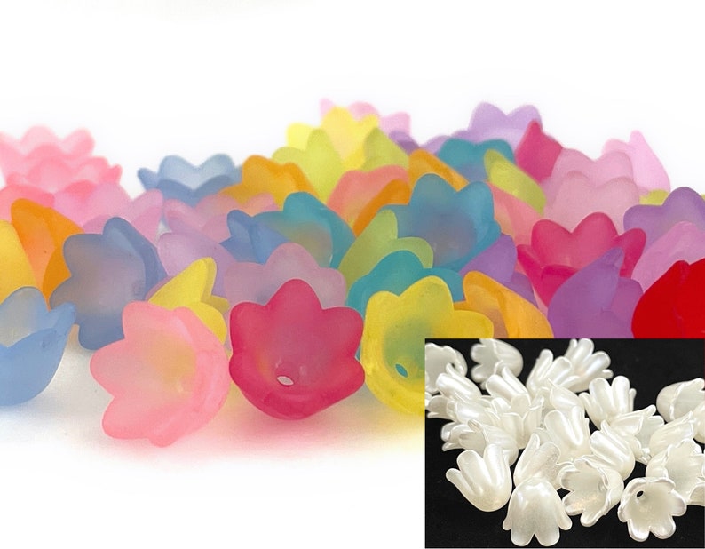 May include: Assortment of colorful plastic flower-shaped beads, with a close-up of white plastic flower-shaped beads.