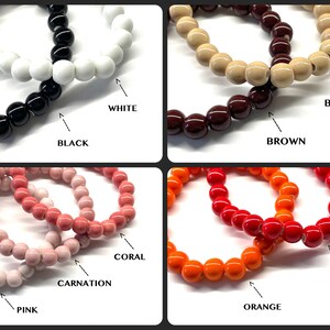 May include: A set of ten bracelets with different colored beads. The colors are white, black, beige, brown, coral, carnation, pink, orange, and red.