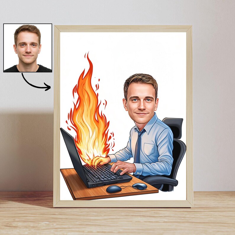 May include: Framed cartoon illustration of a man working on a laptop with flames erupting from it. The man is wearing a blue shirt and tie. A smaller photo of the man is in the upper left corner.