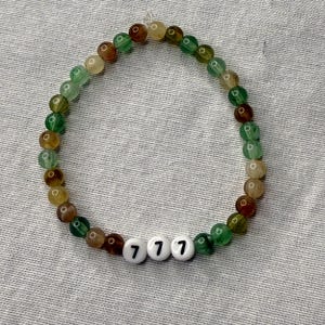 Angel Number 777 Beaded Bracelet. Brown, Beige, and Green Acrylic Beads.
