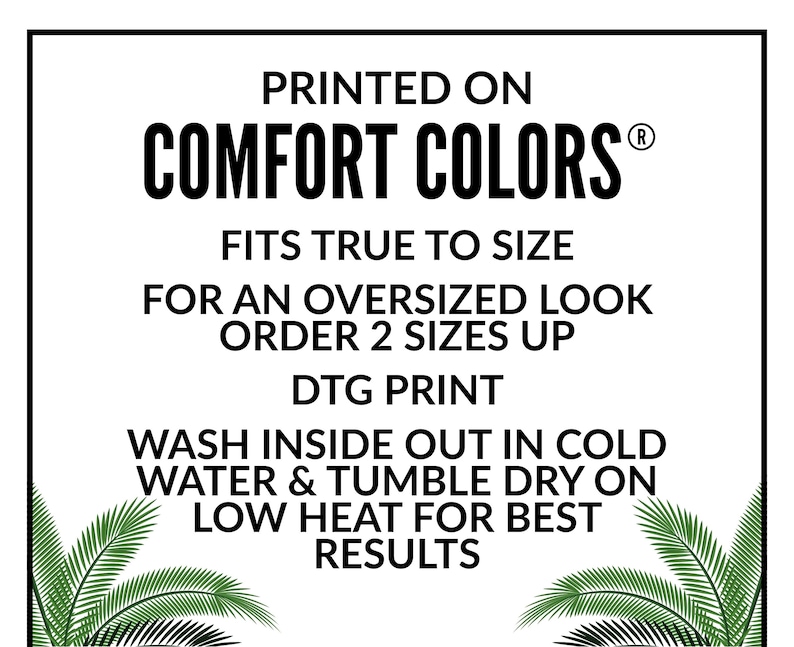 May include: White graphic with black text that reads "PRINTED ON COMFORT COLORS&reg;" and care instructions. The text advises to wash inside out in cold water and tumble dry on low heat. Palm fronds frame the text.