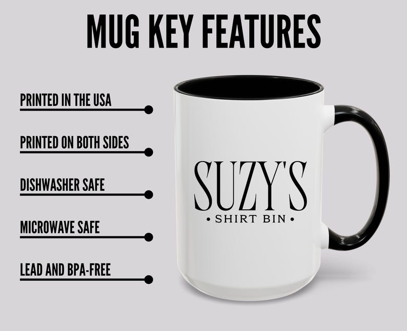 Pu&ograve; includere: Tazza bianca con interno e manico neri. La tazza presenta la scritta "SUZY'S SHIRT BIN" in nero. L'immagine include anche il testo che indica che la tazza &egrave; stampata negli Stati Uniti, stampata su entrambi i lati, lavabile in lavastoviglie e microonde, senza piombo e senza BPA.