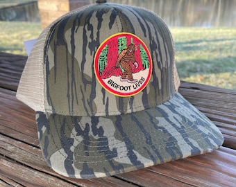 Bigfoot Mossy Oak Bottomland Camo Trucker Hat