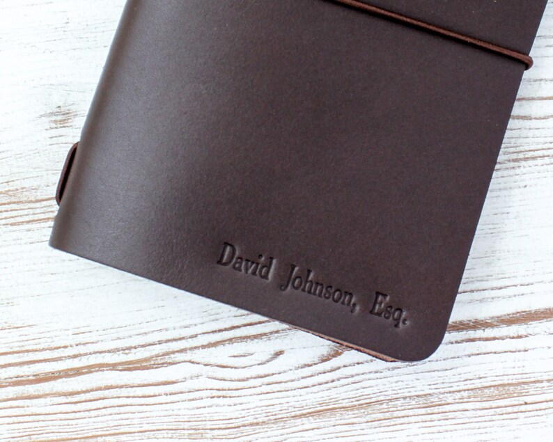 Brown leather refillable notebook with personalized name and Esq. stamped into the leather. Gift for lawyers.