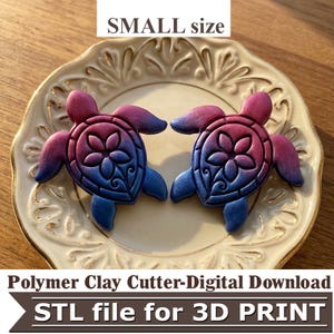 May include: A set of three ceramic mugs with a speckled, matte finish in cream, light grey, and dark grey. Each mug has a simple, minimalist design and a rounded handle.