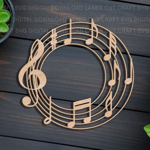 May include: A light brown wooden musical note design, featuring a treble clef and musical notes in a circular arrangement. The design is set on a dark wooden surface, with potted plants surrounding it.