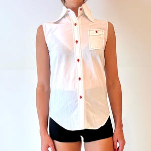 Vintage white sleeveless top with red details