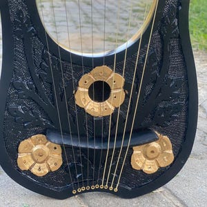 Black and Gold Lyre Design