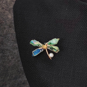 Iridescent Dragonfly Brooch: Gold-Tone Insect Jewelry with Pearl