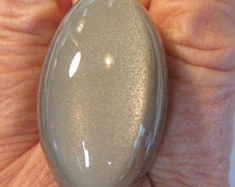 HUGE . Silver Cat's Eye  Moonstone cab.      38 x 21 x 16 mm.   105.25 cts. B5504