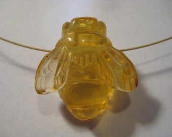 carved Amber  Bee bead  . Real . Natural Amber .        22 x 21 x 12 mm .        B5338