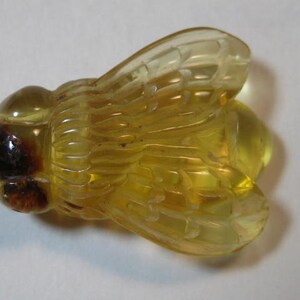 carved Amber  Bee bead  ....... Real ... Natural Amber ...         25 x 18 x 7 mm .........         a3963