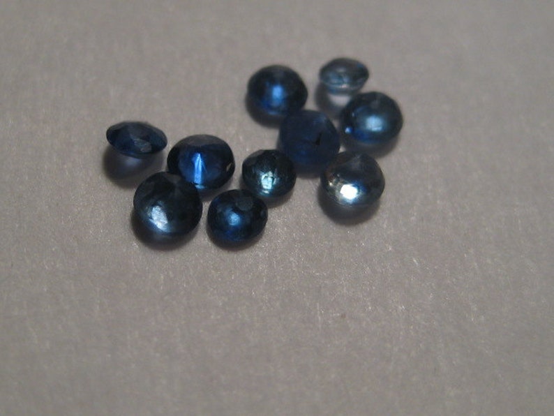 Blue Madagascar Sapphires ...... a2890 1.9 mm 2.1 mm ..... 10 pieces ....
