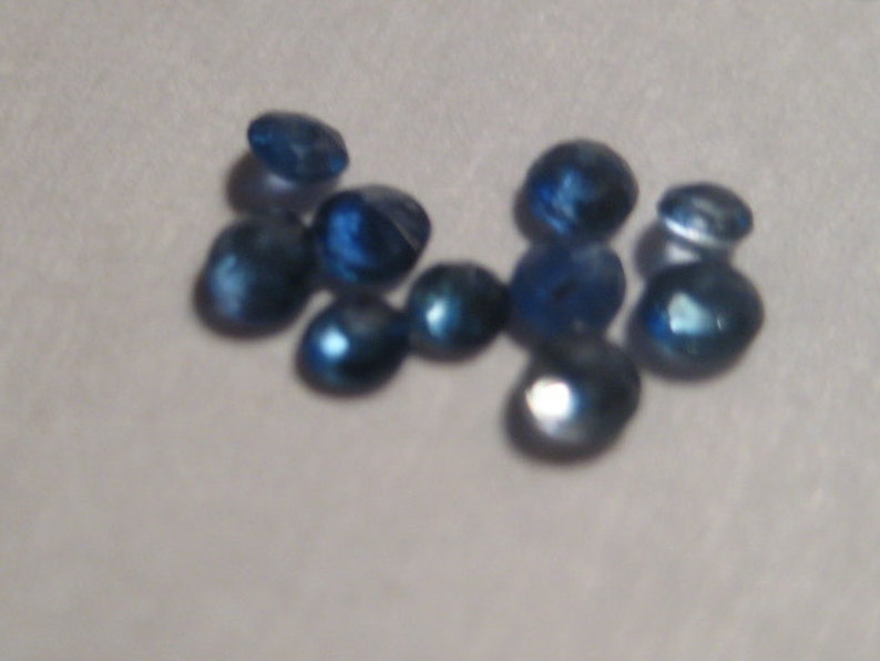 Blue Madagascar Sapphires ...... a2890 1.9 mm 2.1 mm ..... 10 pieces ....