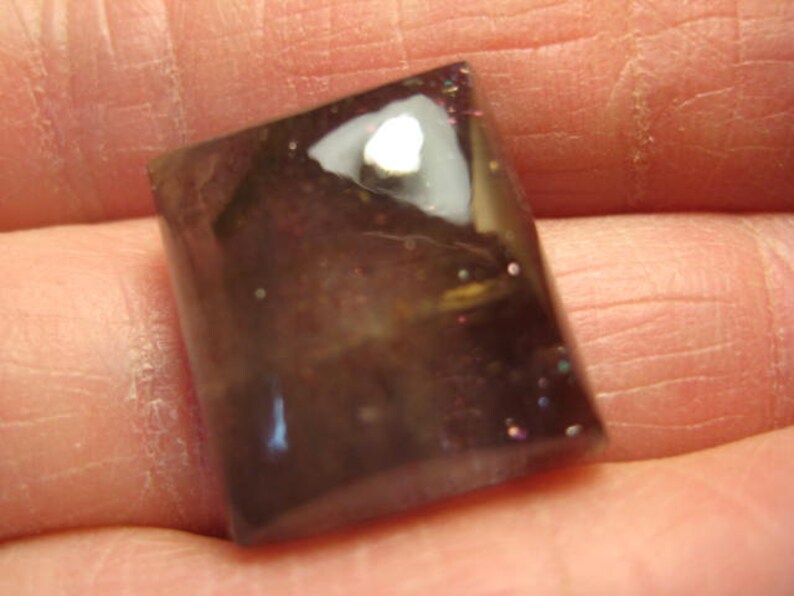 B5140 16 x 15 x 7 mm .. Blue Iolite Sunstone cab ........