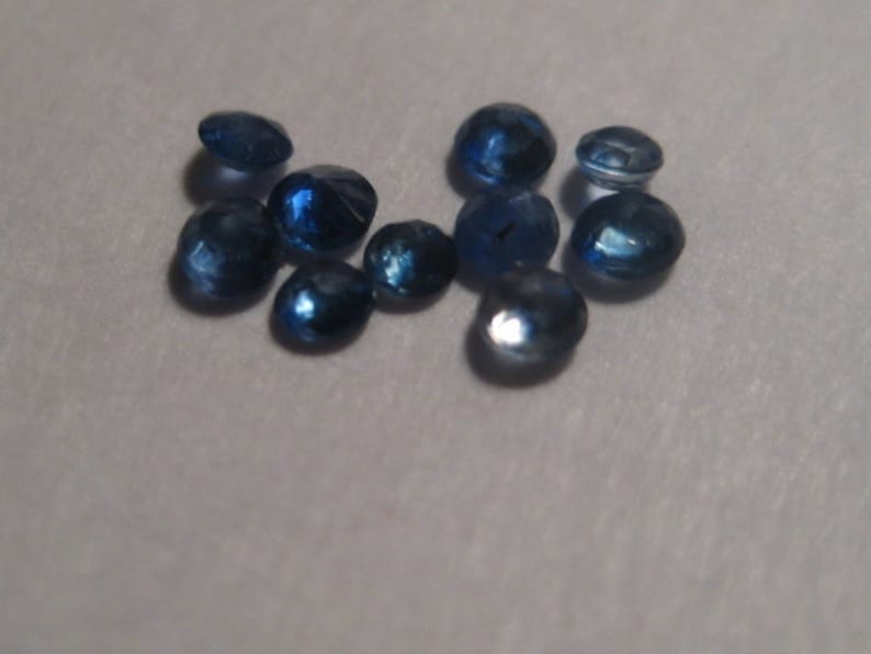 Blue Madagascar Sapphires ...... a2890 1.9 mm 2.1 mm ..... 10 pieces ....