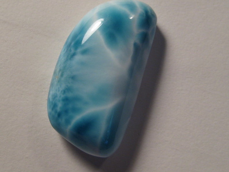 33 x 17 x 9 mm thick ........... a8 Larimar cab .......