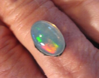 Ethiopian Opal cab    17 x 7 x 4.9 mm .           B5414