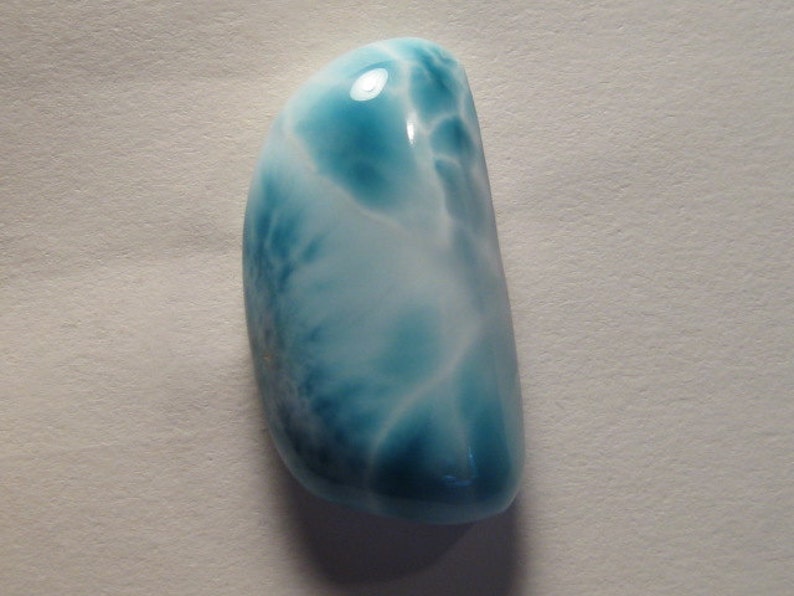 33 x 17 x 9 mm thick ........... a8 Larimar cab .......