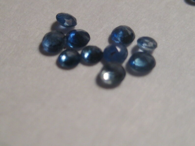 Blue Madagascar Sapphires ...... a2890 1.9 mm 2.1 mm ..... 10 pieces ....