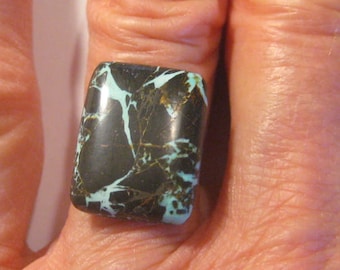 Austinblå. Naturlig Nevadaturkos hölje. Austinblå.. 18 x 14 x 3,8 mm. B4785