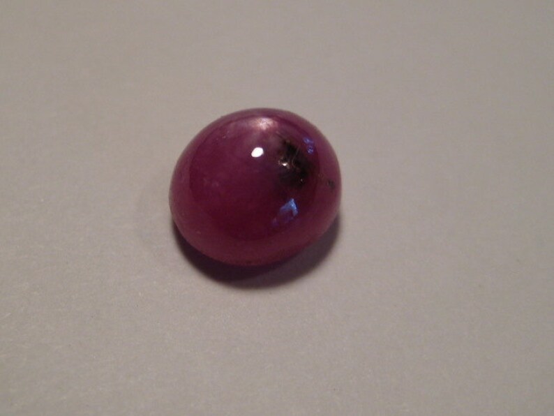 Star Ruby cab ..... 1277 6 mm x 4 mm tall ..