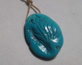 Turquoise kraal ......leuk.. gesneden bloem ...... 27 x 19 x 6 mm ..... a4332