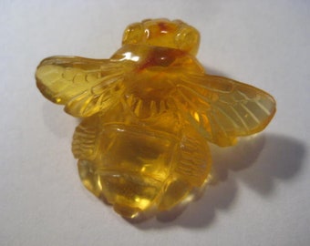 Carved Amber  Bee bead  . Real . Natural Amber .   24 x 29 x 7 mm   .      B5447