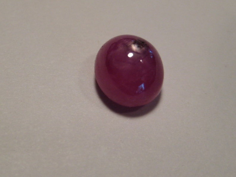 Star Ruby cab ..... 1277 6 mm x 4 mm tall ..
