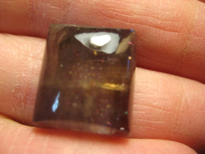 B5140 16 x 15 x 7 mm .. Blue Iolite Sunstone cab ........