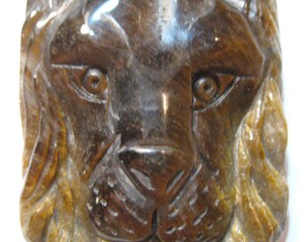 Snidad tigeröglejonhängespärla ... 41 x 33 x 10 mm .... B4010