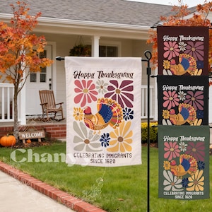 May include: Thanksgiving garden flag with a turkey and floral design. The flag reads "Happy Thanksgiving" and "Celebrating Immigrants Since 1620". Additional flags in burgundy, black, and olive green are also displayed.