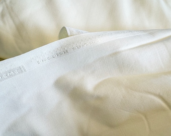 Ivory suiting fabric solid, Supreme English suiting poly viscose, feels like wool
