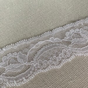 Domestic lace trim 1 1/2” wide white scalloped trim light weight scalloped trim sold by the yard