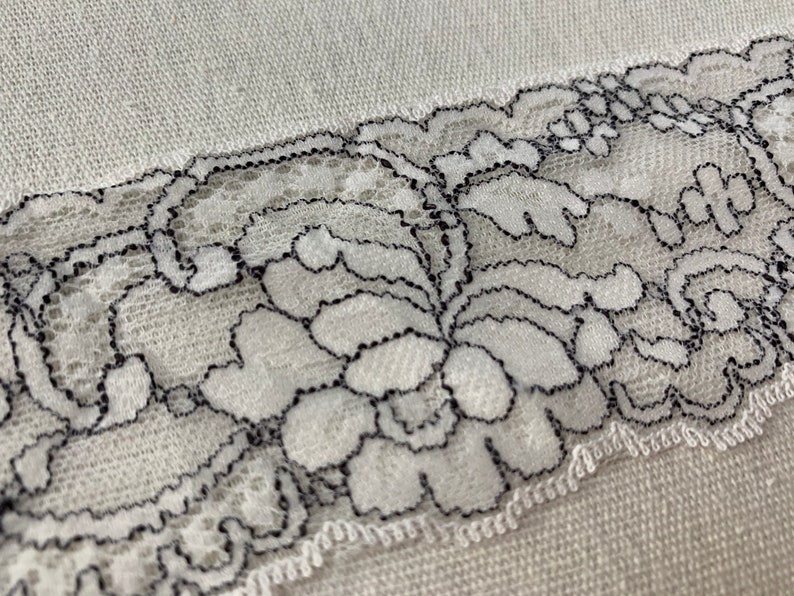 Domestic lace trim 2 14\u201d wide white and black scalloped trim light weight scalloped floral trim sold by the yard