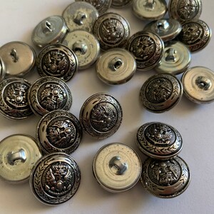 Silver buttons with textured military design medium button design finish with shank back size are 3/4” 6 to the order