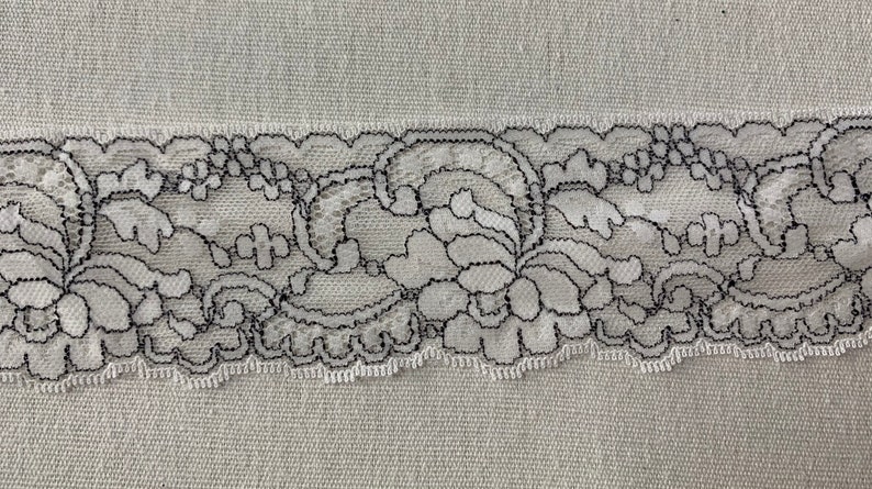 Domestic lace trim 2 14\u201d wide white and black scalloped trim light weight scalloped floral trim sold by the yard