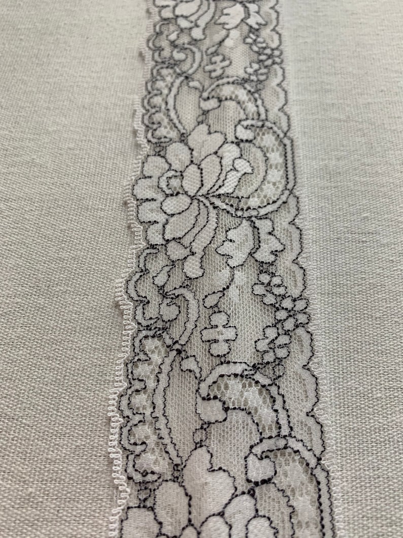 Domestic lace trim 2 14\u201d wide white and black scalloped trim light weight scalloped floral trim sold by the yard