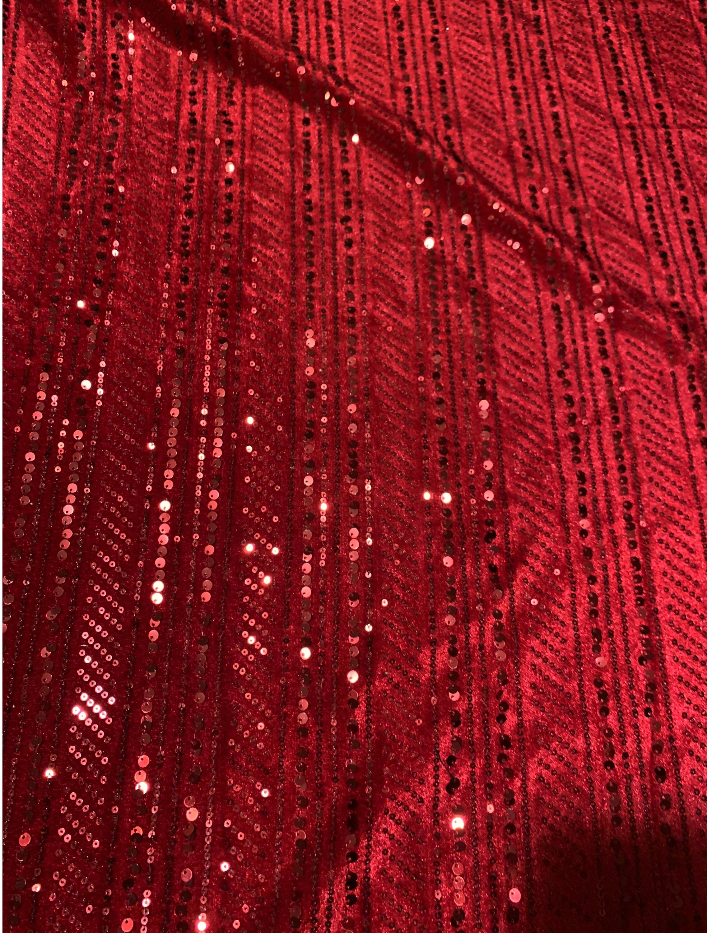 Deep red sequin on stretch velour in a stripe design by the yard sequin fabric