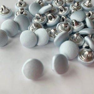 Bridal Buttons satin covered by the Dozen color pool gray metal backing covered buttons. Pool gray satin covered button gray covered button
