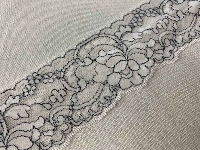Domestic lace trim 2 14\u201d wide white and black scalloped trim light weight scalloped floral trim sold by the yard