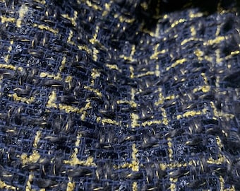 Navy blue sparkle tweed fashion fabric with gold metallic thread