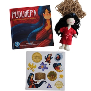 May include: A book titled "Puduhepa - Hittite Queen of Peace" with a colorful illustration of a woman on the cover. A small red fabric doll with black hair and a book of stickers with illustrations of the woman and other symbols.