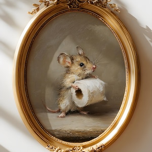 May include: An oval-shaped, ornate gold frame containing an oil painting of a small brown mouse holding a white roll of toilet paper. The frame features intricate floral carvings at the top and bottom, surrounding the detailed animal portrait.