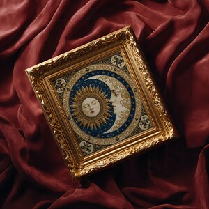May include: A rectangular wall art piece in an ornate gold frame featuring a central circular illustration of a sun and a crescent moon with human faces. The artwork is set against a deep blue background with gold stars and intricate floral patterns.