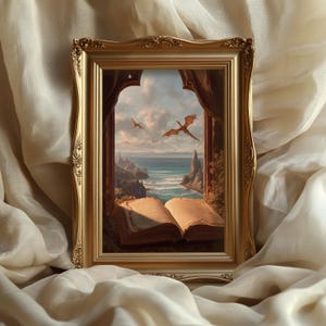 May include: A framed painting in a gold ornate frame. The artwork shows a fantasy scene with dragons flying over a coastal landscape, seen through a window. An open book is in the foreground.