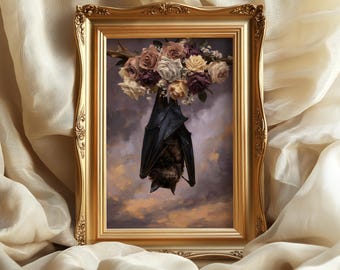 May include: A rectangular gold-toned ornate frame containing a print of a dark bat hanging upside down from a cluster of white, cream, and deep purple roses against a cloudy, sunset-colored sky background with soft lighting.