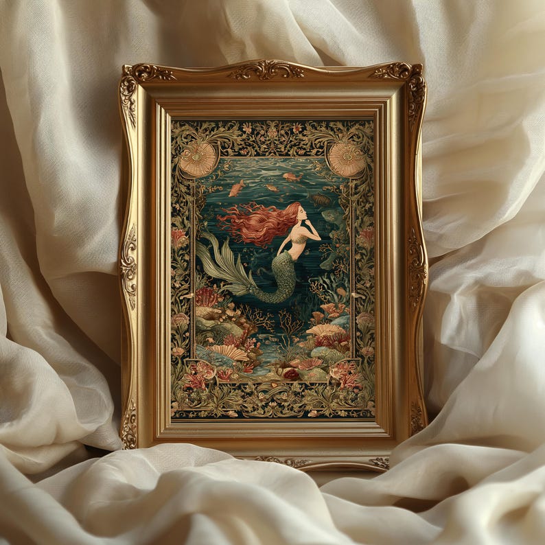 May include: A framed art print featuring a mermaid with flowing red hair and a green tail, swimming in an underwater scene. The artwork is set within an ornate gold frame, showcasing a vintage aesthetic. The print includes coral and fish.