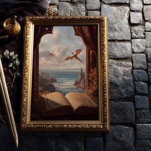 May include: A framed fantasy art print featuring dragons soaring over a coastal landscape with an open book in the foreground. The artwork is in a gold ornate frame. A sword and other decorative items are on the left.