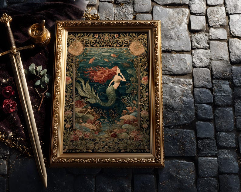 May include: A framed artwork featuring a mermaid with flowing red hair in an underwater scene. The artwork is in a gold frame with ornate detailing. A sword and decorative items are next to the framed artwork.